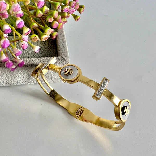 Gold Stainless Steel Tory Bangle | STYLIZE FASHION