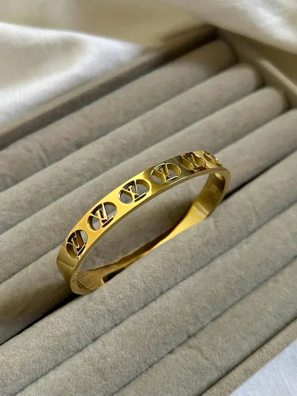 Golden Hollow Stainless Bangle | STYLIZE FASHION