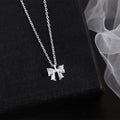 Silver Bow Pendant Necklace | STYLIZE FASHION