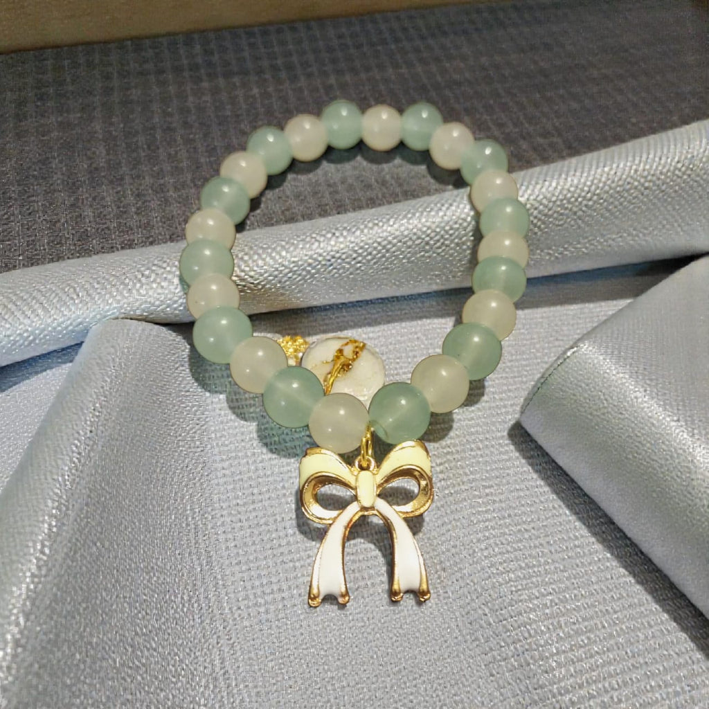 Jade-Tone & Pearl Cream Beaded Bracelet with Enamel Bow Accent